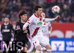 31.01.2026, Fussball 1. Bundesliga 2025/2026, 20.Spieltag, FC Augsburg - FC St. Pauli, in der WWK-Arena Augsburg. v.li: Tomoya Ando (St. Pauli) gegen Michael Gregoritsch (Augsburg) 
