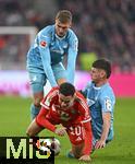 08.02.2026, Fussball Bundesliga 2025/2026, 21.Spieltag, FC Bayern München - TSG 1899 Hoffenheim, in der Allianz-Arena München,   v.l. Jamal Musiala (Bayern München) gegen Albian Hajdari (TSG 1899 Hoffenheim) 


