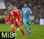 08.02.2026, Fussball Bundesliga 2025/2026, 21.Spieltag, FC Bayern München - TSG 1899 Hoffenheim, in der Allianz-Arena München,   v.l. Konrad Laimer (FC Bayern München) gegen Muhammed Damar (TSG 1899 Hoffenheim) 


