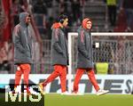 11.02.2026, Fussball DFB-Pokal 2025/2026, Viertelfinale, FC Bayern München - RB Leipzig, in der Allianz-Arena München. v.l. Alphonso Davies (FC Bayern München), Jamal Musiala (Bayern München) und Joshua Kimmich (FC Bayern München) 


