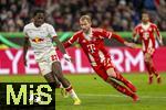 11.02.2026, Fussball DFB-Pokal 2025/2026, Viertelfinale, FC Bayern München - RB Leipzig, in der Allianz-Arena München. v.li: Castello Lukeba (RB Leipzig) gegen Konrad Laimer (FC Bayern München) 